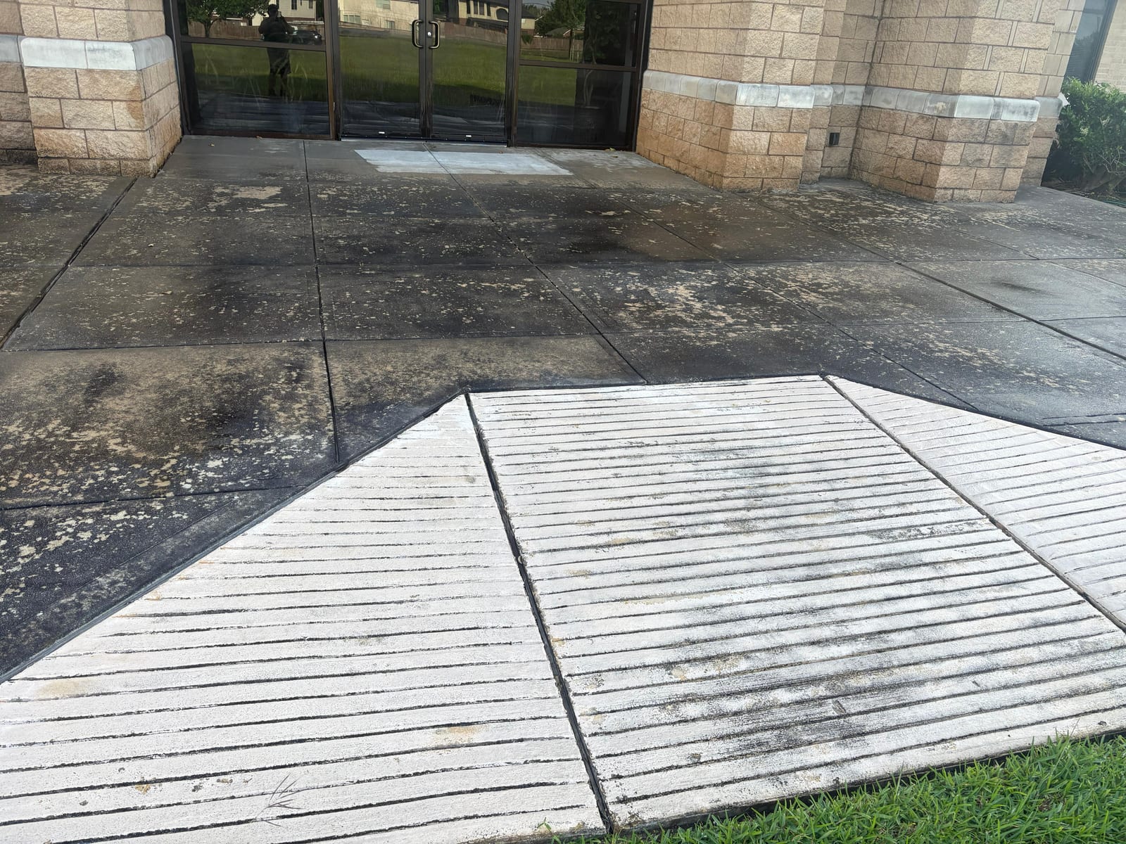 Concrete walkway clean — before