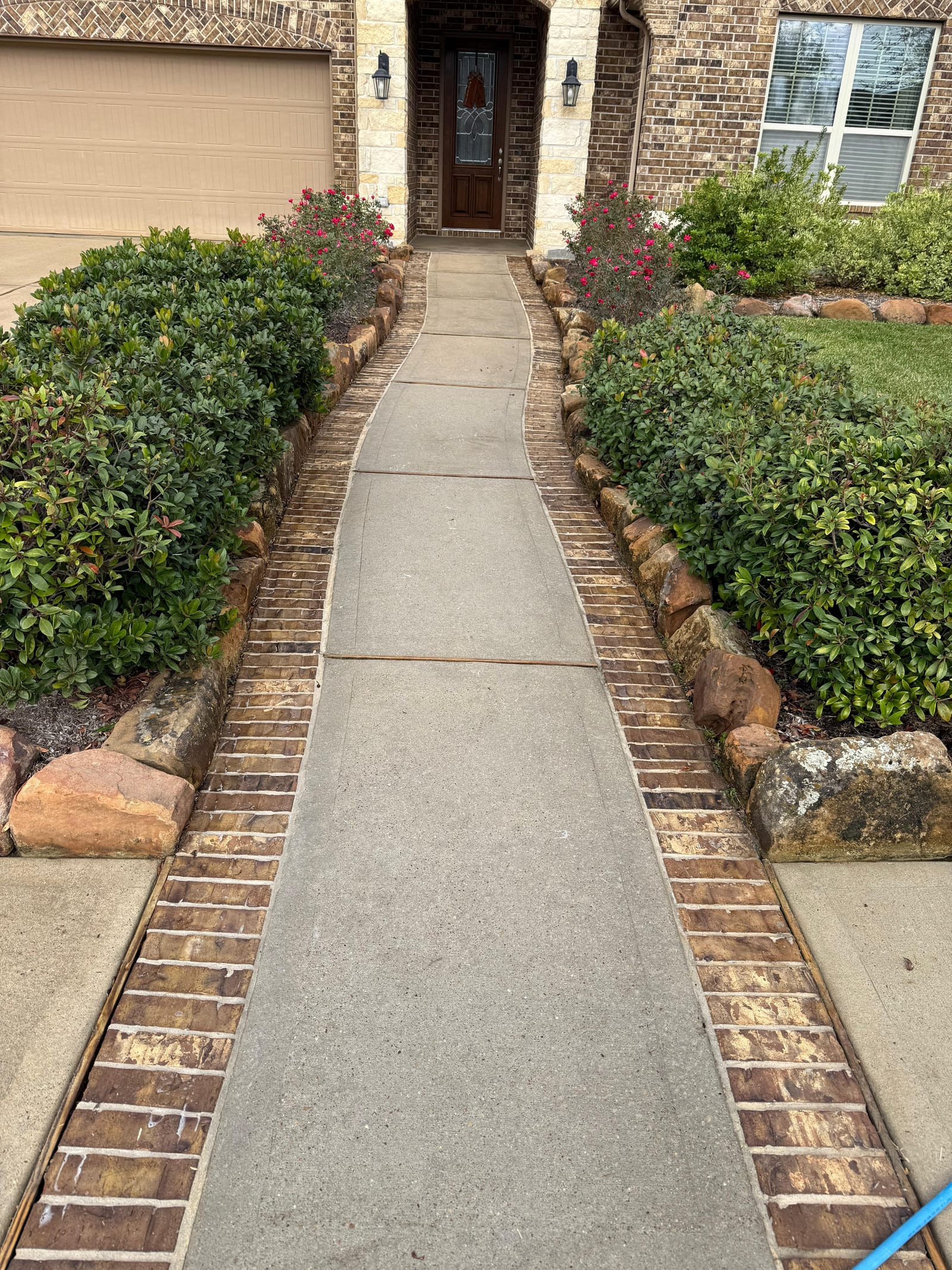 Sidewalk between landscaping — after