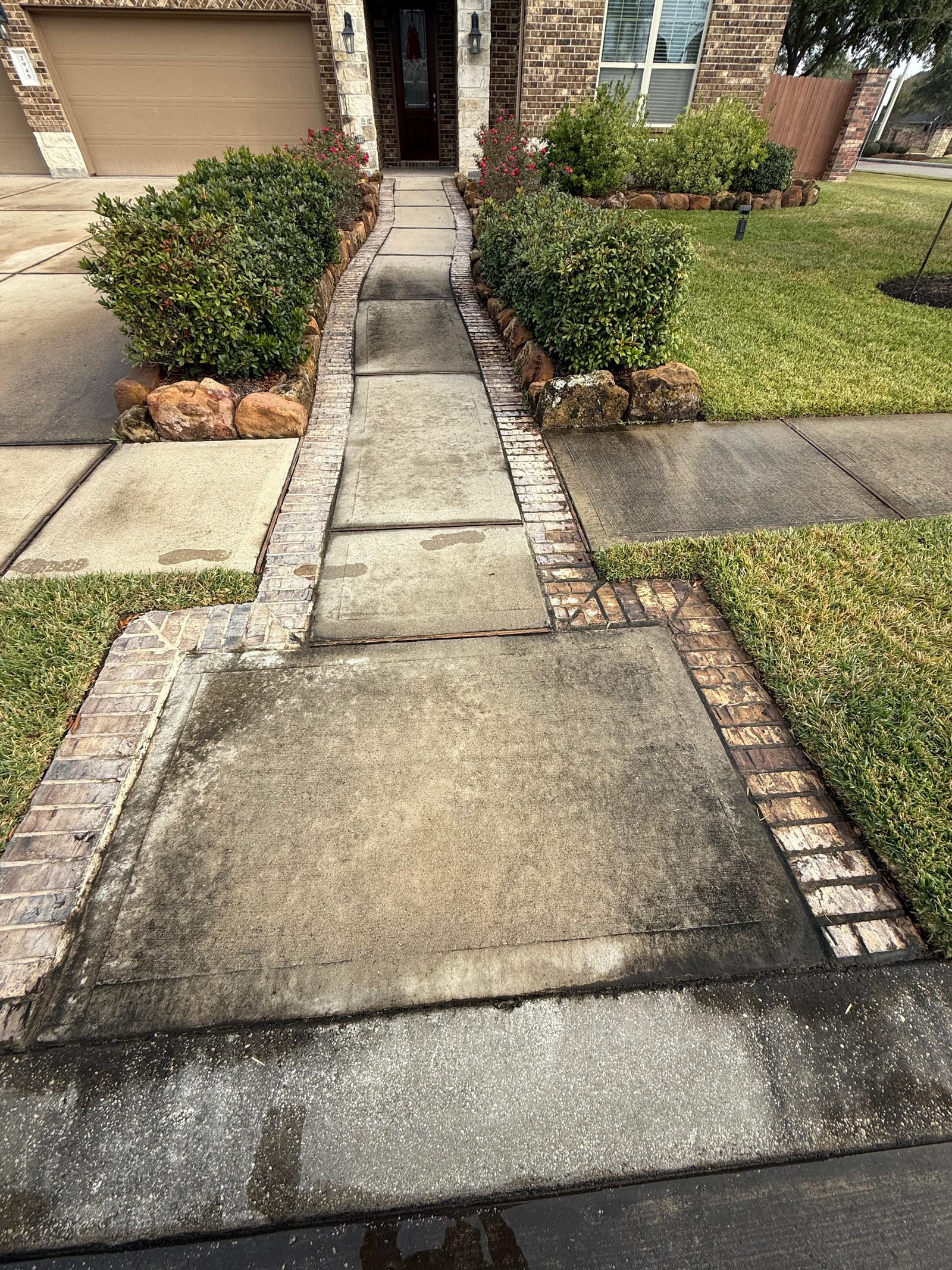 Sidewalk between landscaping — before